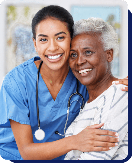 Home care nurse smiling with an older woman